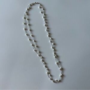 Silver Twine Embracing Pearlescent Pebbles J30